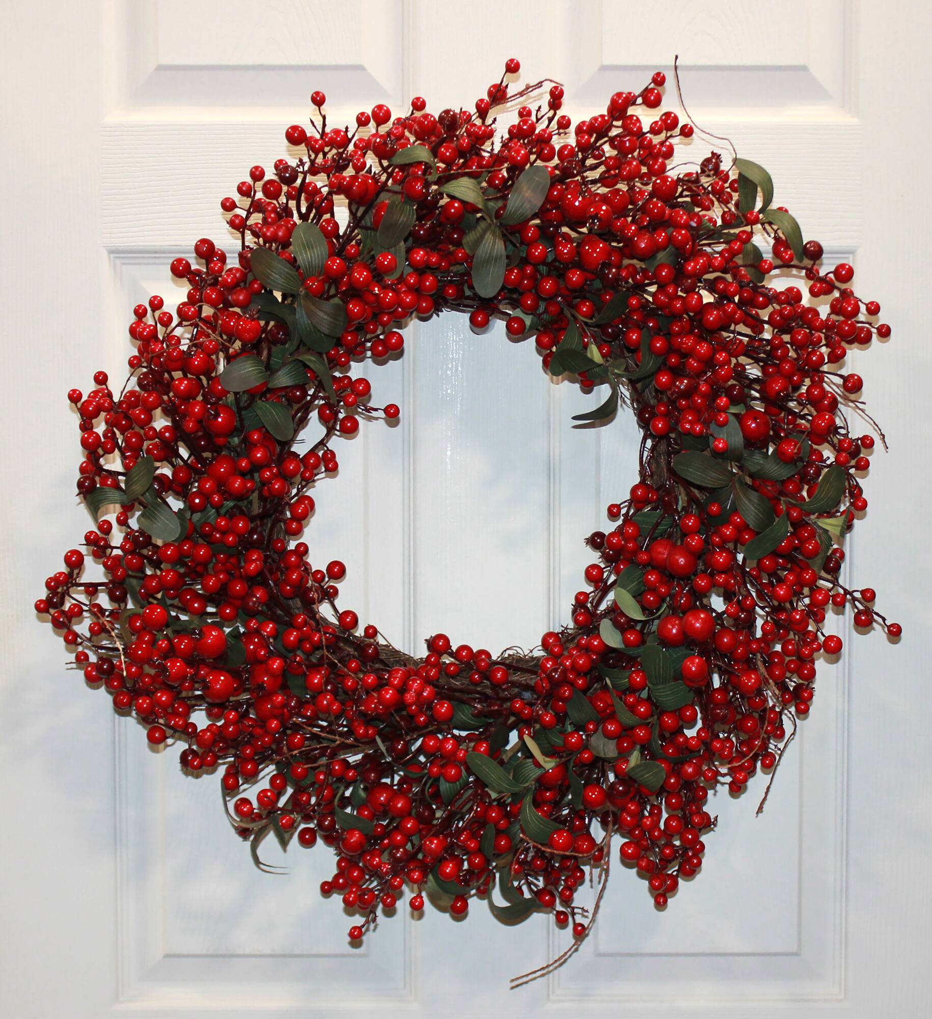 Worth Imports 22" Red Holly Berry and Green Leaves Artificial Christmas Wreath on Natural Twig Base